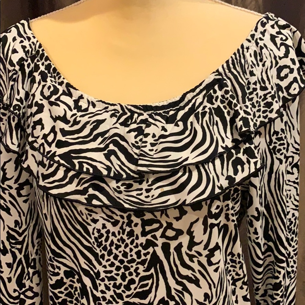 Ruffled neck zebra dress.
